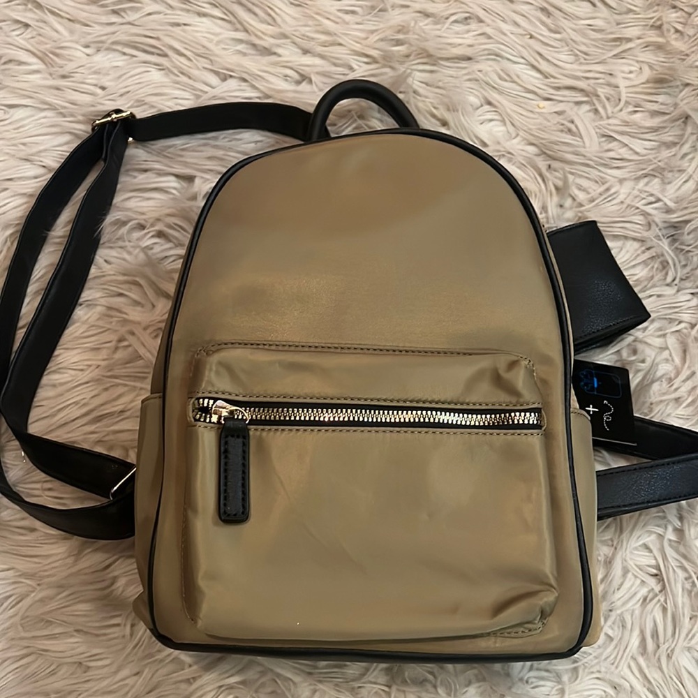Brand new, olive green, medium-sized backpack